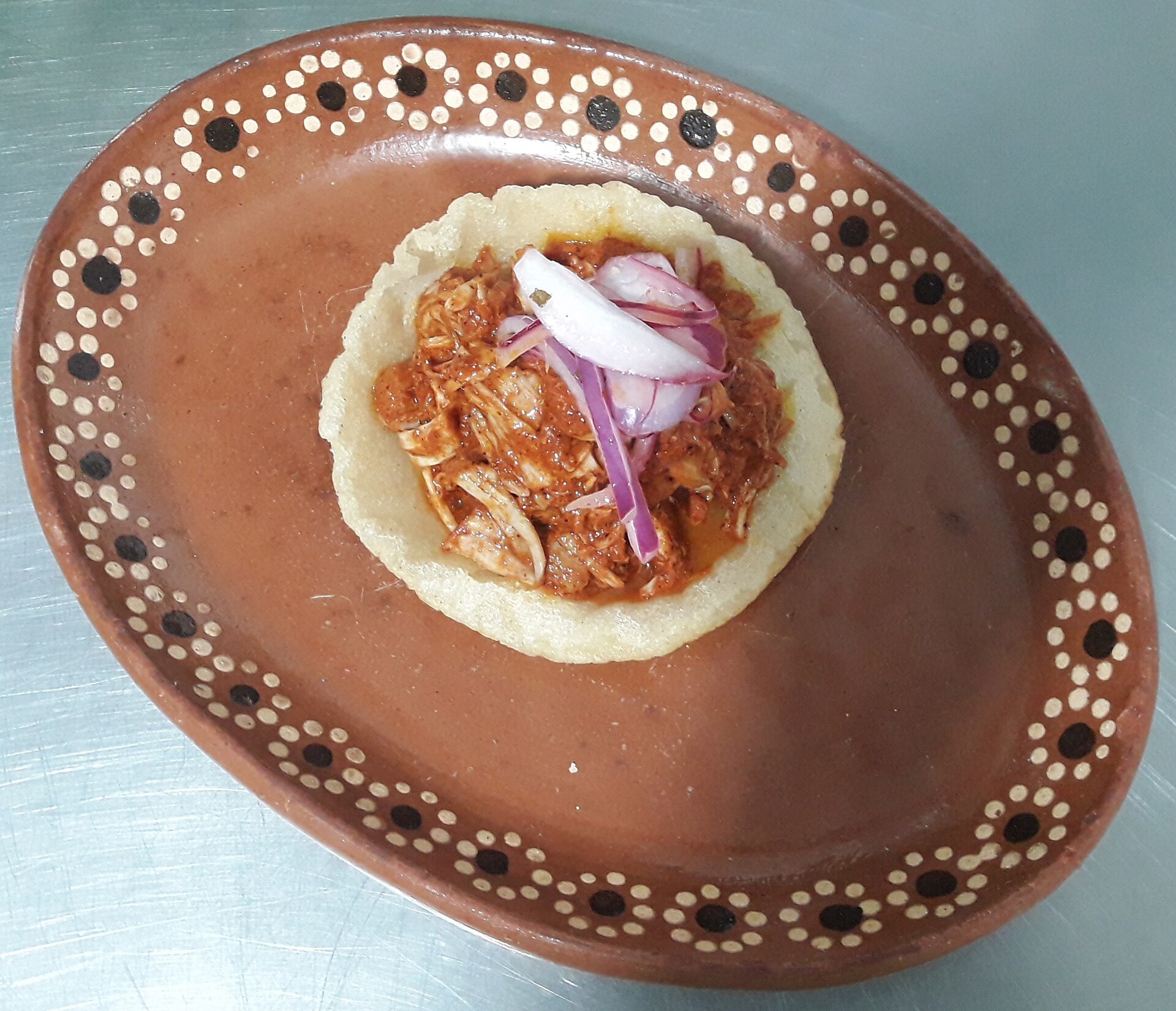 Cochinita pibil with pickled red onion